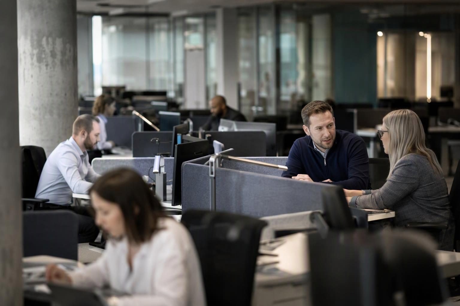 Wide view of staff working on a financial services operations floor